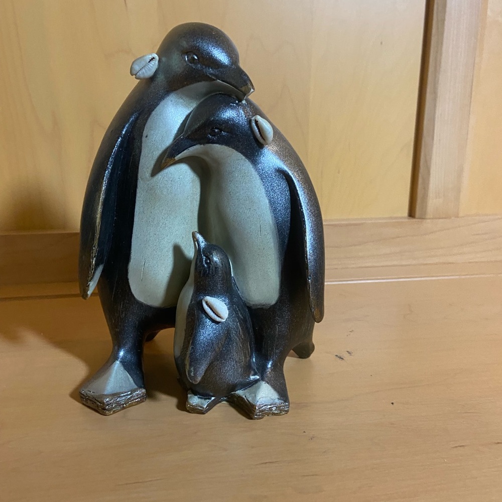 Elegant Brown Penguin Family Sculpture